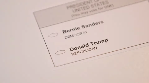 Hand casting a ballot paper to Donald Trump 스톡 동영상 64455368