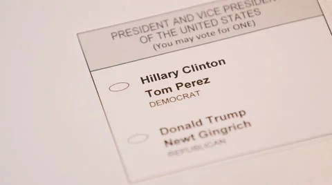 Hand casting a ballot paper to Hillary Clinton Stock Footage 64455310