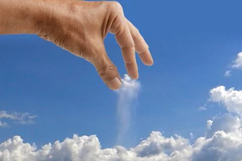 Hand catching cloud Stock Photos