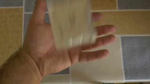 Hand catching condom in motion - safe sex awareness concept Stock Footage 311760209