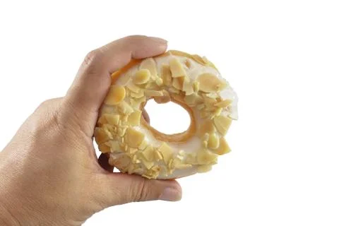 Hand is caught a doughnut Foto stock