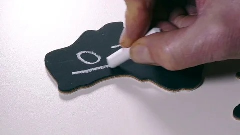 Hand chalking OZ on map cutout of Australia. Stock Footage 71795182