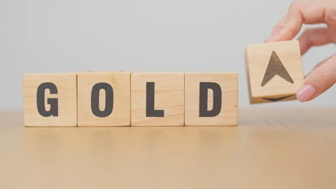 Hand change wood cube block with GOLD text to UP and Down arrow symbol icon.. Stock Footage 327284776