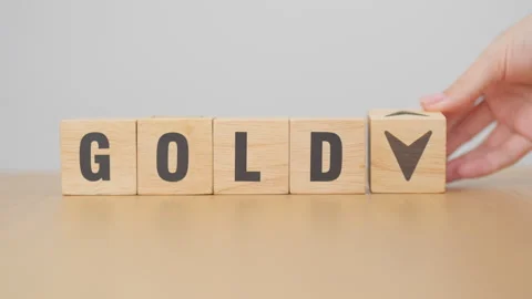 Hand change wood cube block with GOLD text to UP and Down arrow symbol icon.. Stock Footage 328069718