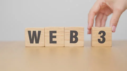 Hand change wooden block from WEB 2 to WEB 3. Centralization, Blockchain, D.. Stock Footage 328071277