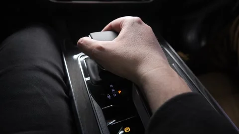 The hand changes the gearbox.Close-up inside the car Stock Footage 270486305