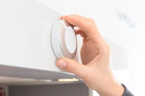 Hand changes program ventilation Stock Photos