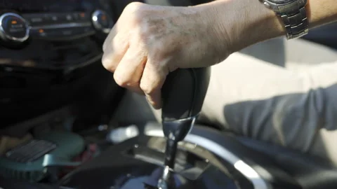 Hand Changing Gear, switches the automatic transmission's Video stock 148009774