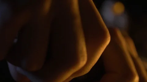 A hand is changing the head of a dynamic microphone in a half-light. Stock Footage 116846118