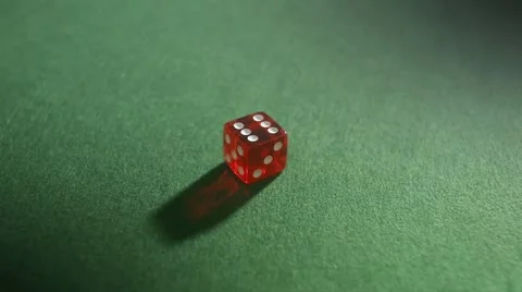A hand changing the result of a dice Stock Footage 11339032