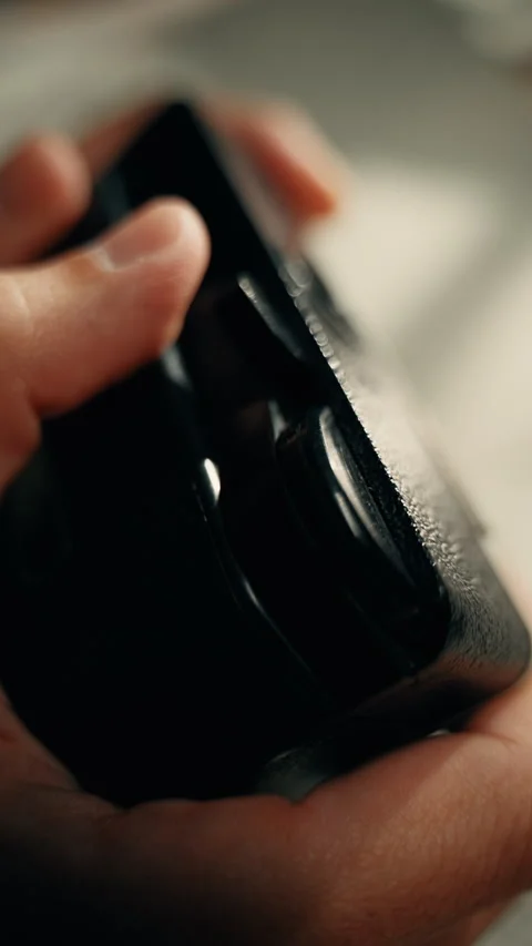 Hand Charging Camera Roll Stock Footage 336568700