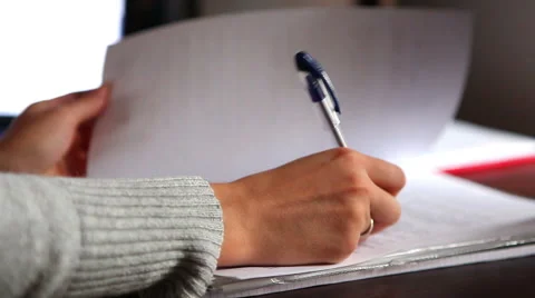 Hand checking and signing contract, document Stock Footage 56909134