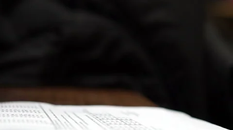 Hand checking Numbers on paper Stock Footage 58935698