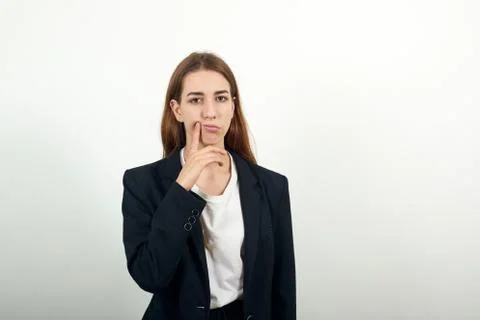 Hand chin thinking about question, pensive expression. Doubt. Thoughtful face. Stock Photos