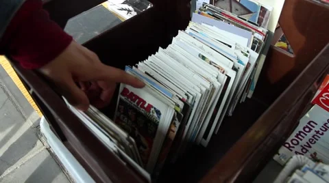 Hand chooses retro postcards close-up. Video stock 67851447