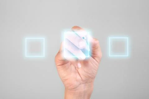 Hand choosing one of three options with hologram on light grey background Stock Photos