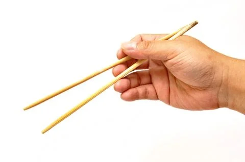 Hand with chopsticks Stock Photos