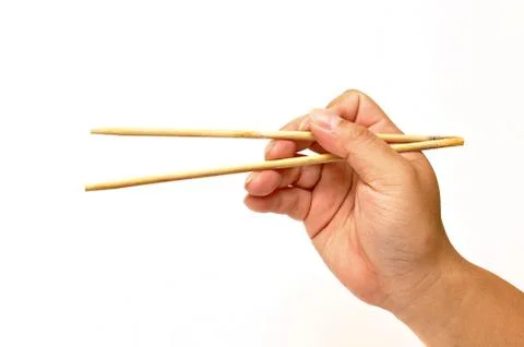 Hand with chopsticks Stock Photos