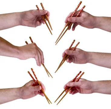 Hand with chopsticks Foto stock