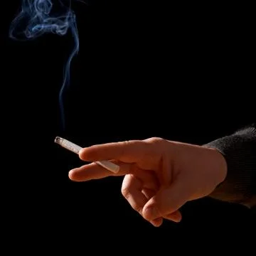 Hand With Cigarette Stock Photos