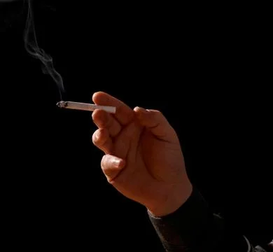Hand With Cigarette Stock Photos