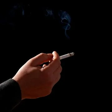 Hand With Cigarette Stock Photos