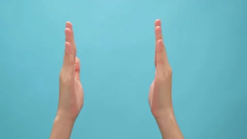 Hand clapping on the blue background. celebration concept. 스톡 동영상 153957365