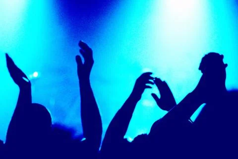 Hand clapping at a concert Stock Photos