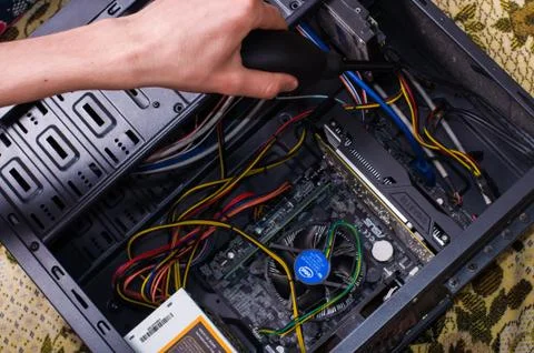 Hand clean black computer pc with air pear Stock Photos