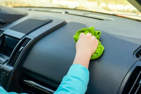 Hand clean the car interior, Console car cleaning with a microfiber cloth. hy Stock Photos