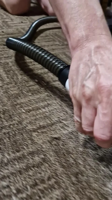 Hand Cleaning Dirty Brown Carpet Using Vacuum Cleaner Upholstery Tool Stock Footage 339080979