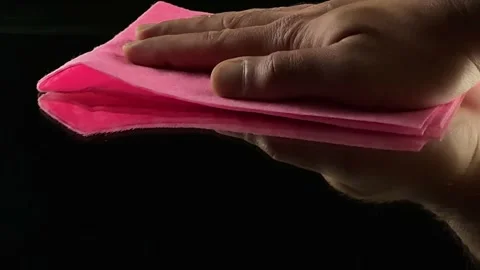 Hand Cleaning Glass Surface with pink Microfiber Cloth Stock Footage 334320660