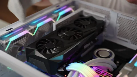 Hand cleaning graphics processing unit gpu inside personal computer, performing Stock Footage 318017526