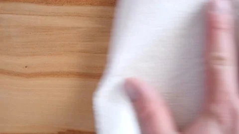 Hand cleaning table with paper towel Stock Footage 88411864