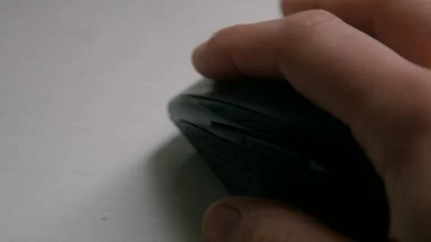 Hand Clicking and Scrolling Using Computer PC Mouse on White Desk Stock Footage 242986564