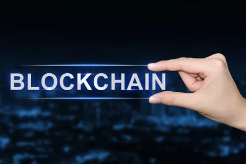 Hand clicking blockchain button Stock Photos