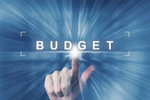 Hand clicking on budget button Foto stock