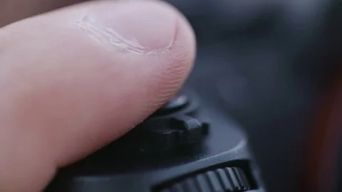 Hand clicking camera button to capture the photo Stock Footage 71569467