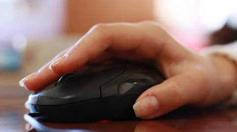 Hand clicking computer mouse Vídeo Stock 22789344