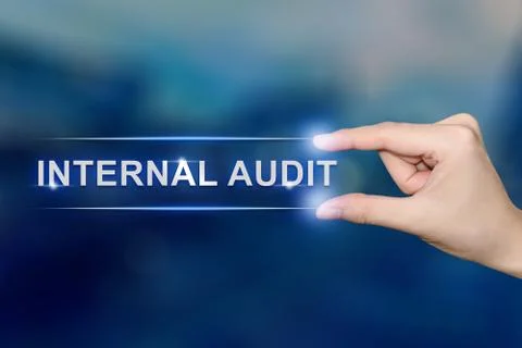 Hand clicking internal audit button Foto stock