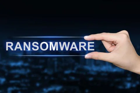 Hand clicking ransomware button Stock Photos