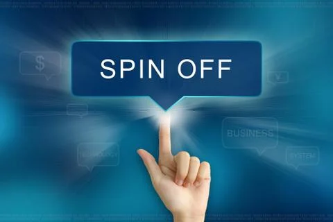 Hand clicking on spin off button Foto stock