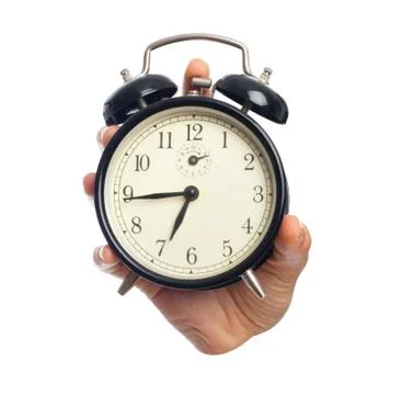 Hand with a clock Stock Photos