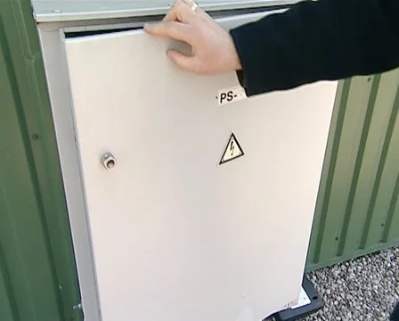 Hand close electric panel Stock Footage 10878233