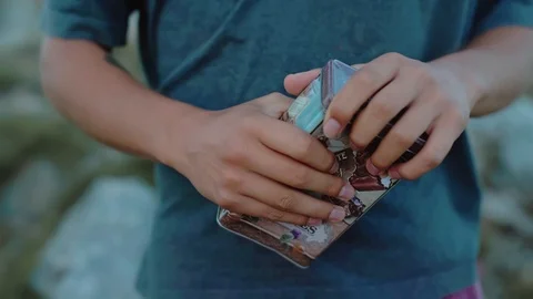 Hand close up of a man opening an old tin box on the top of the mountain Stock Footage 121802793