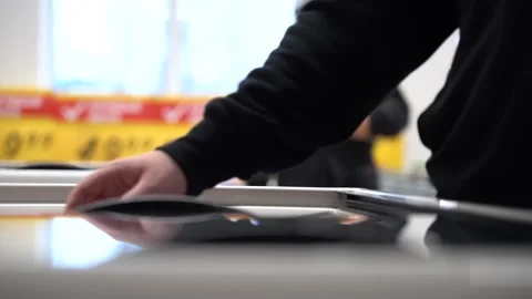 Hand in close-up opens the freezer in the store and takes the frozen product Stock Footage 146256735
