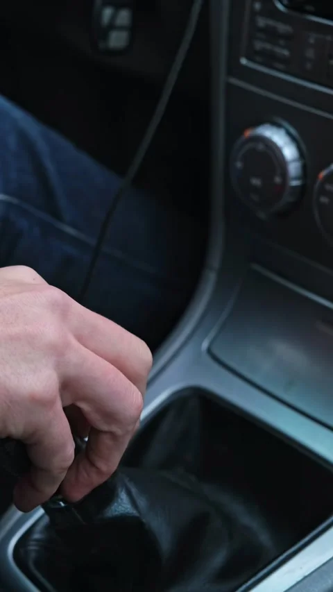 Hand close up switching gear driving the car Stock Footage 232580400