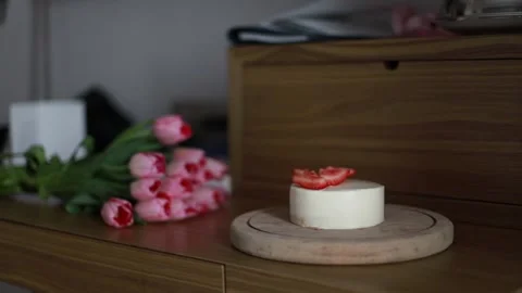 Hand closed a cake under a glass Stock Footage 235558677