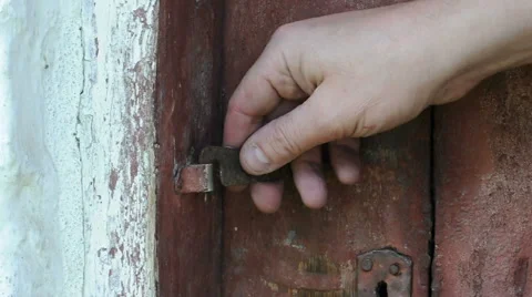 Hand closes and open  door Stock Footage 42422477