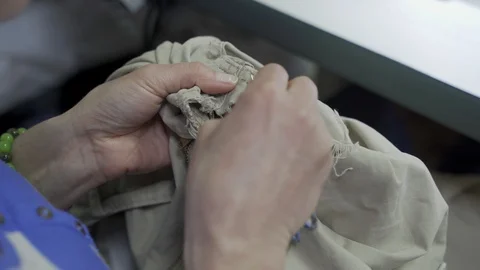 Hand closeup women tailor in at work at Atelier Stock Footage 126938751